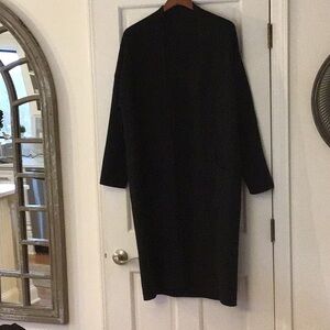 Classic Black Women's Sweater coat with two front pockets.